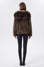 woman wearing a leopard-print faux-fur jacket