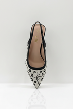 Black and white patterned shoe on a white background