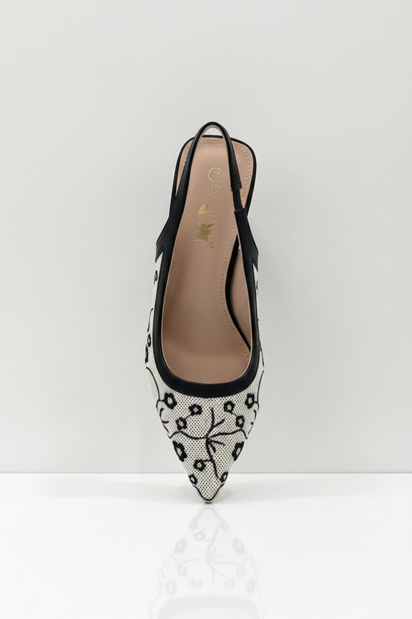 Black and white patterned shoe on a white background