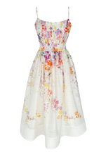 Floral dress with colorful patterns on a white background