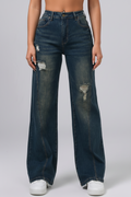 Person wearing blue jeans with a white background