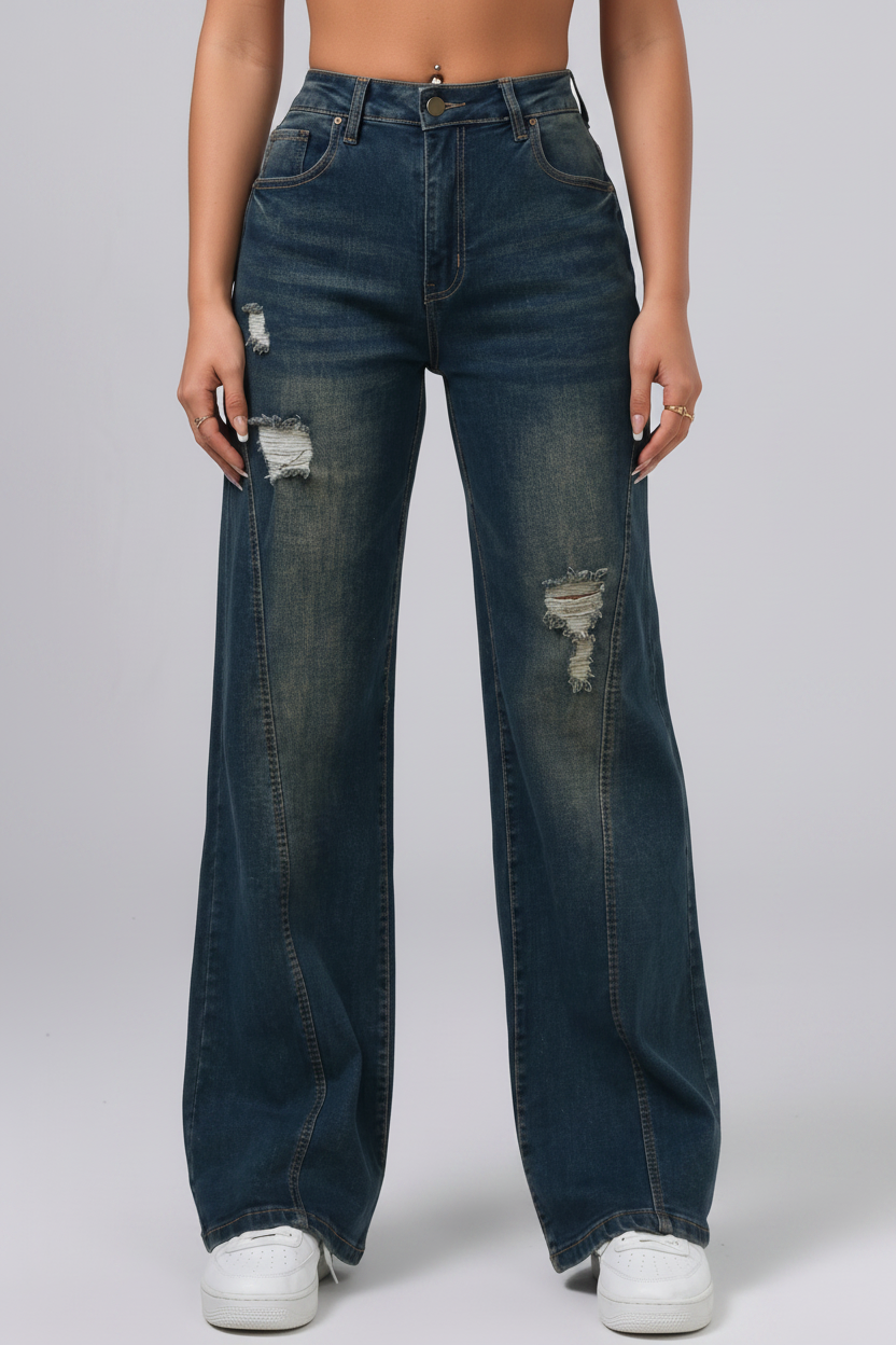 Person wearing blue jeans with a white background
