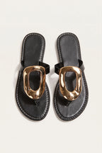The Gilded Buckle Thong Sandal