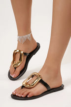The Gilded Buckle Thong Sandal
