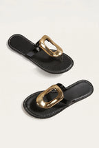 The Gilded Buckle Thong Sandal
