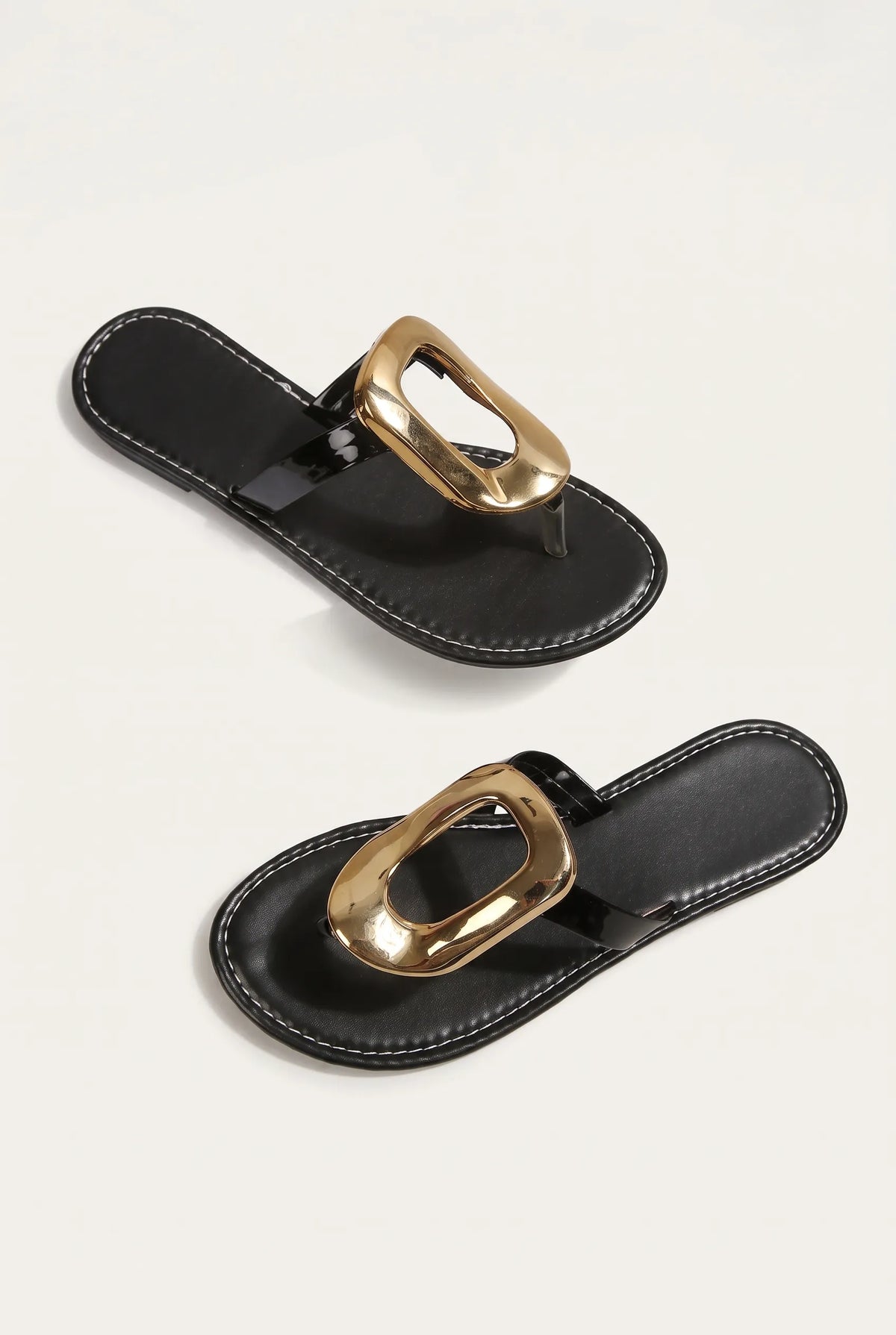 The Gilded Buckle Thong Sandal