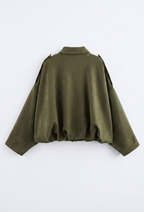 Green cape on a white background
