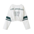 White cropped sweatshirt with 'Los Angeles 997' text on a white background