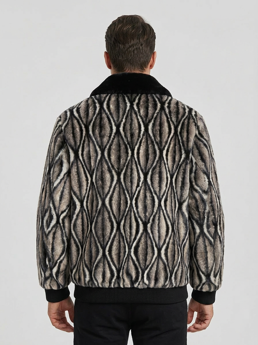 Man wearing a patterned jacket on a plain background
