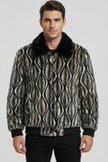 Man wearing a patterned jacket with a fur collar on a light gray background