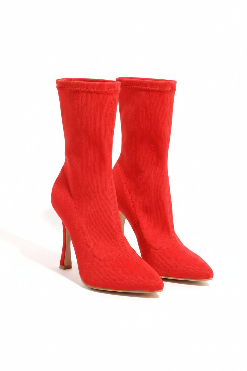 Red high-heeled boots on a white background