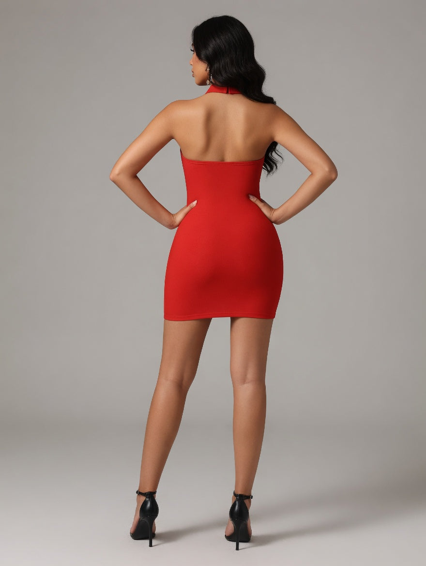 Woman wearing a red dress with a plain background