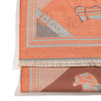 Close-up of a patterned rug with horse design on a white background