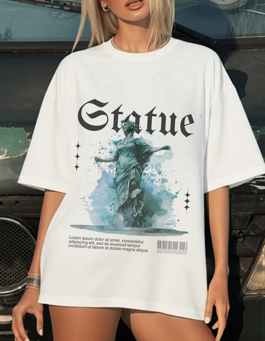 Person wearing a white t-shirt with 'Statue' graphic design.