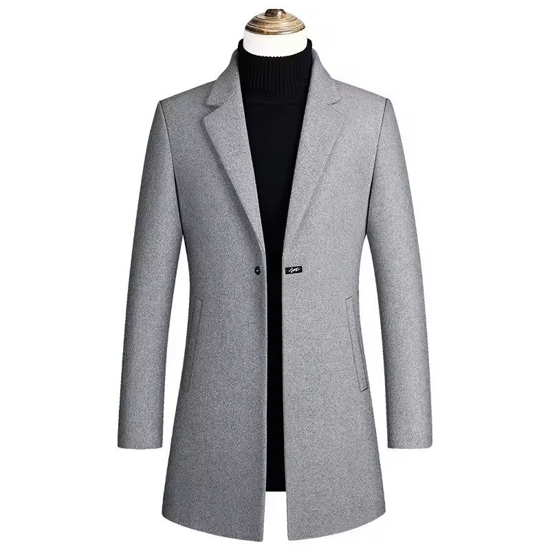 Gray coat on a mannequin with a white background