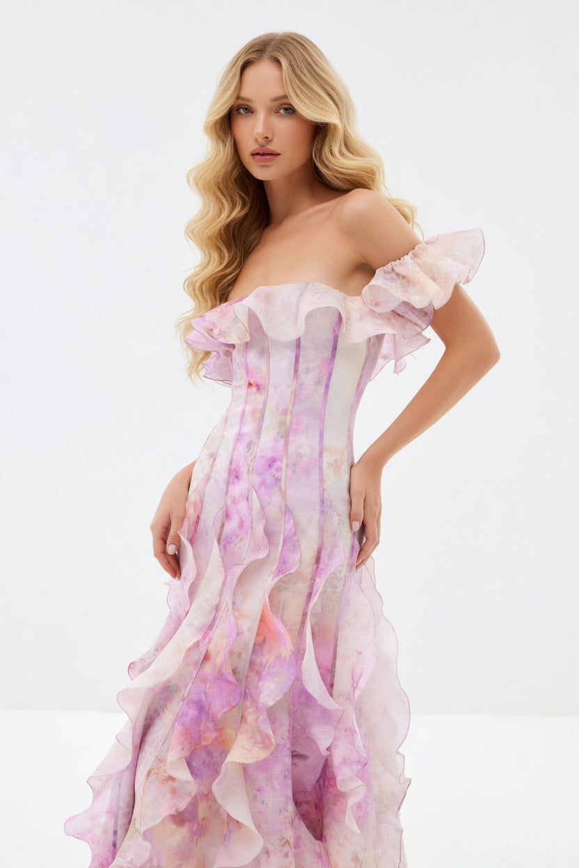 Woman wearing a floral off-shoulder dress on a white background