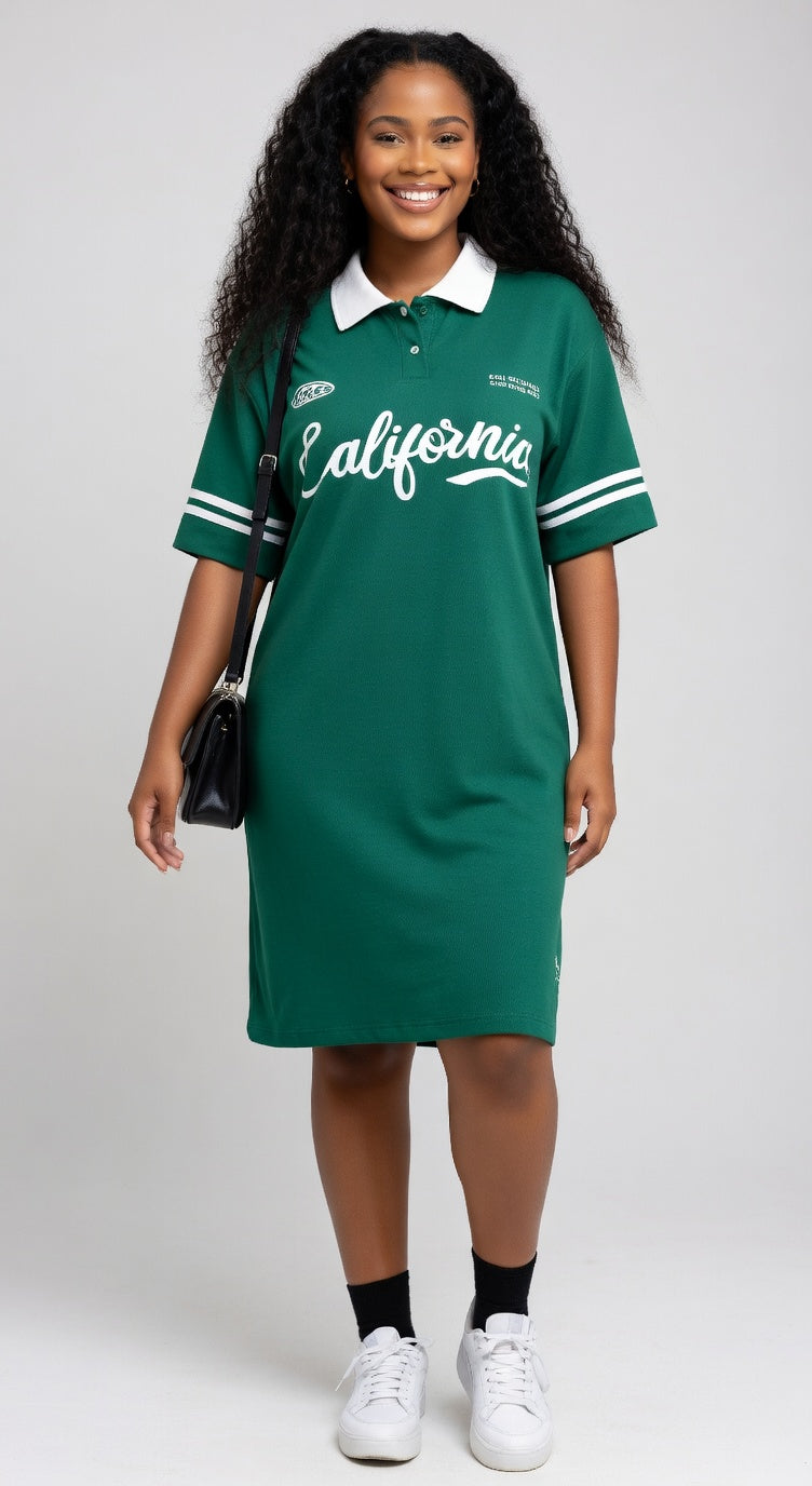 Woman wearing a green 'California' dress with a white collar on a gray background