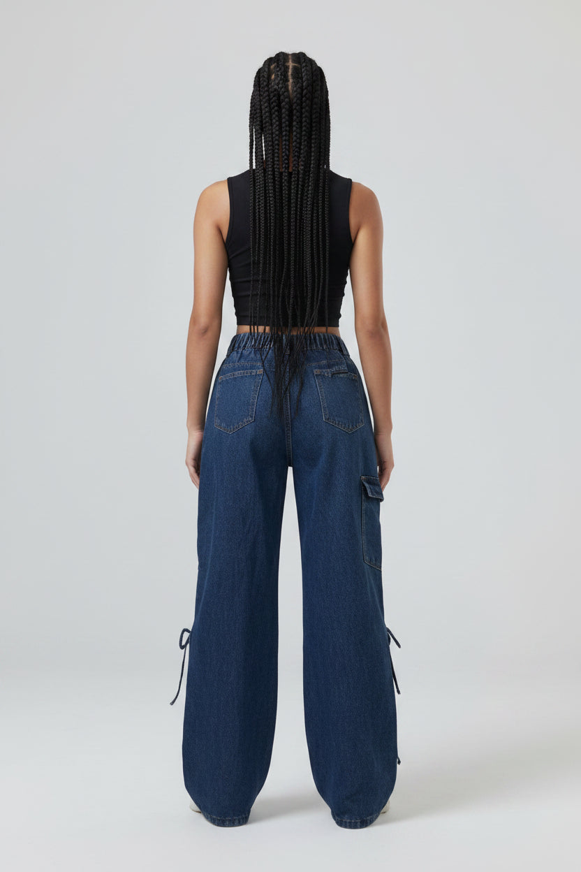 Blue jeans worn by a person on a white background