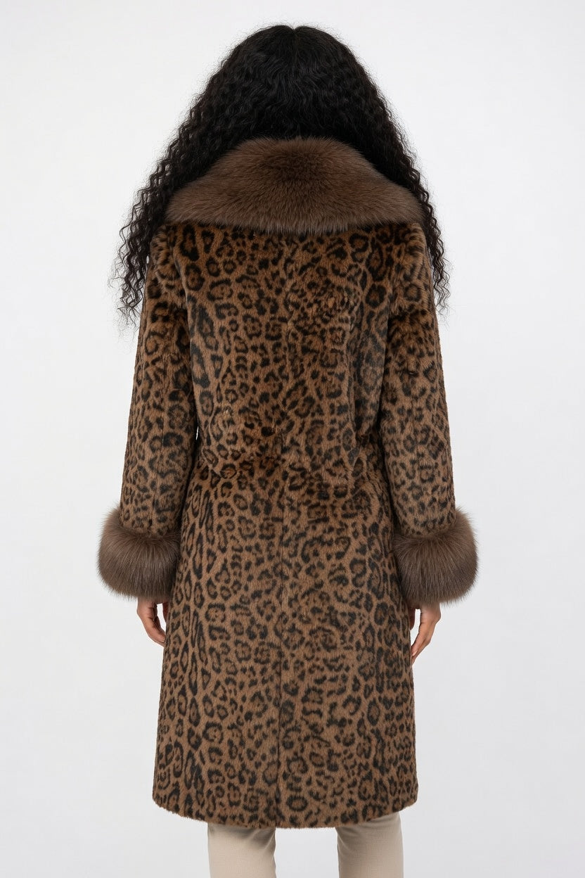 Leopard print coat with fur collar worn by a person on a white background