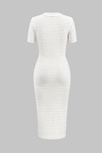 White ribbed dress on a gray background