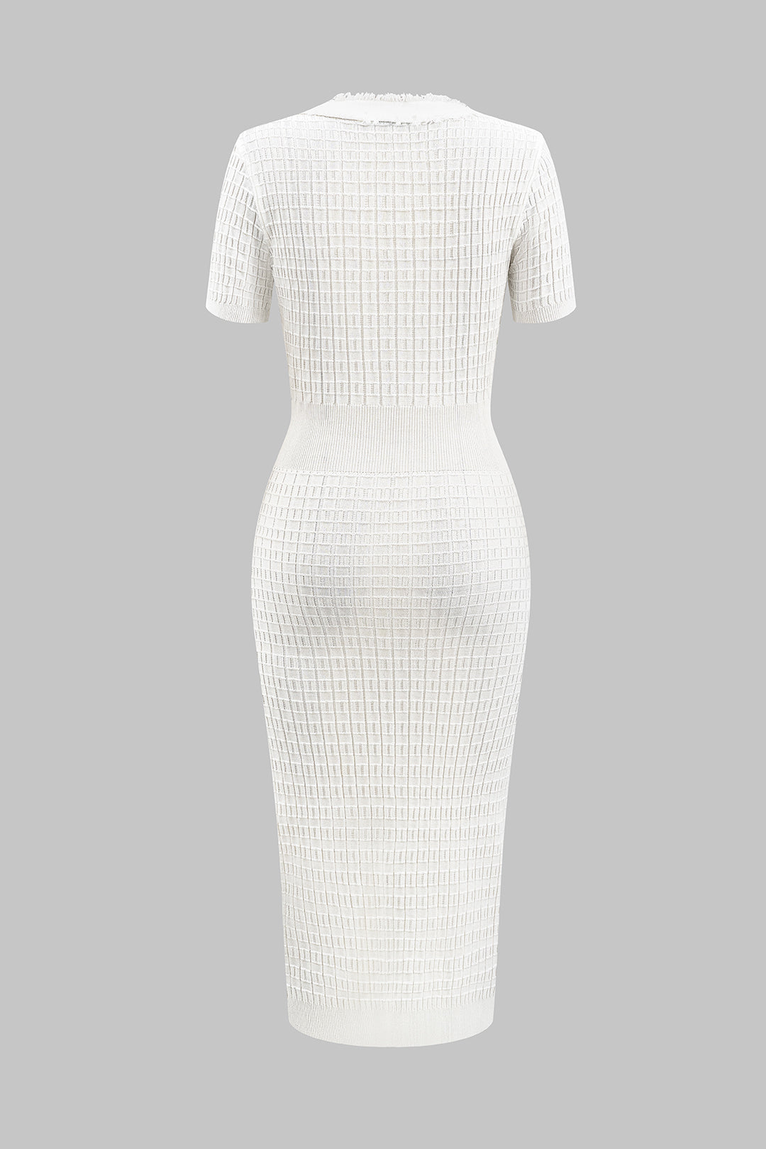 White ribbed dress on a gray background