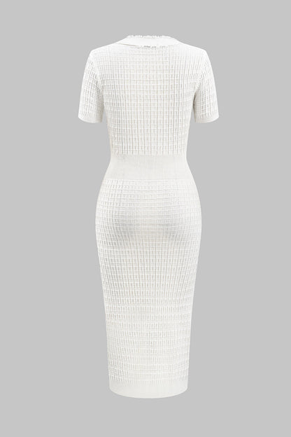 White ribbed dress on a gray background