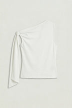 a white asymmetric one-shoulder sleeveless top with subtle neck gathering and a draped tie detail on the left shoulder