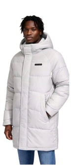 Person wearing a long white puffer coat on a white background