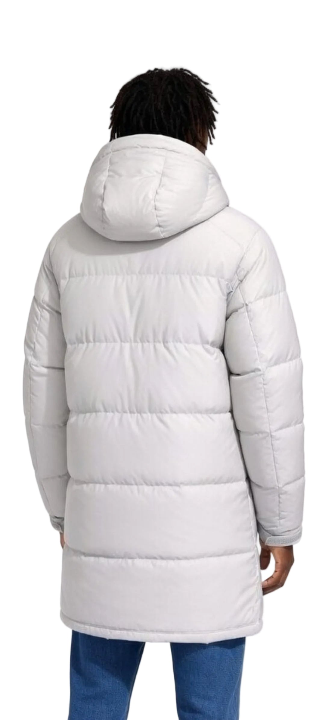 Person wearing a long white puffer coat on a white background