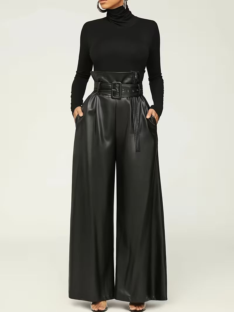 Black turtleneck and wide-leg pants with a belt on a white background