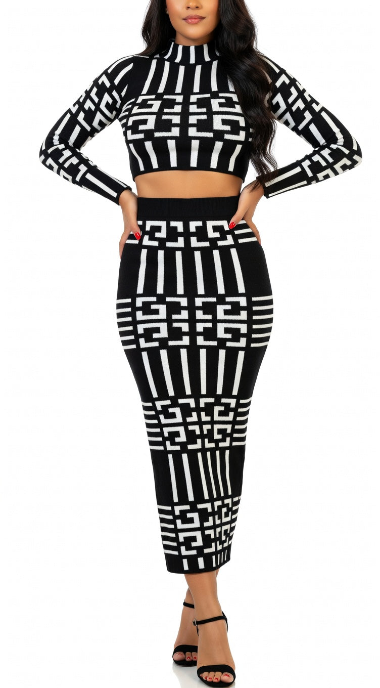 Black and white geometric patterned outfit on a white background