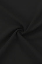 Close-up of black fabric with folds