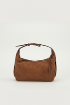 Brown handbag on a light gray background