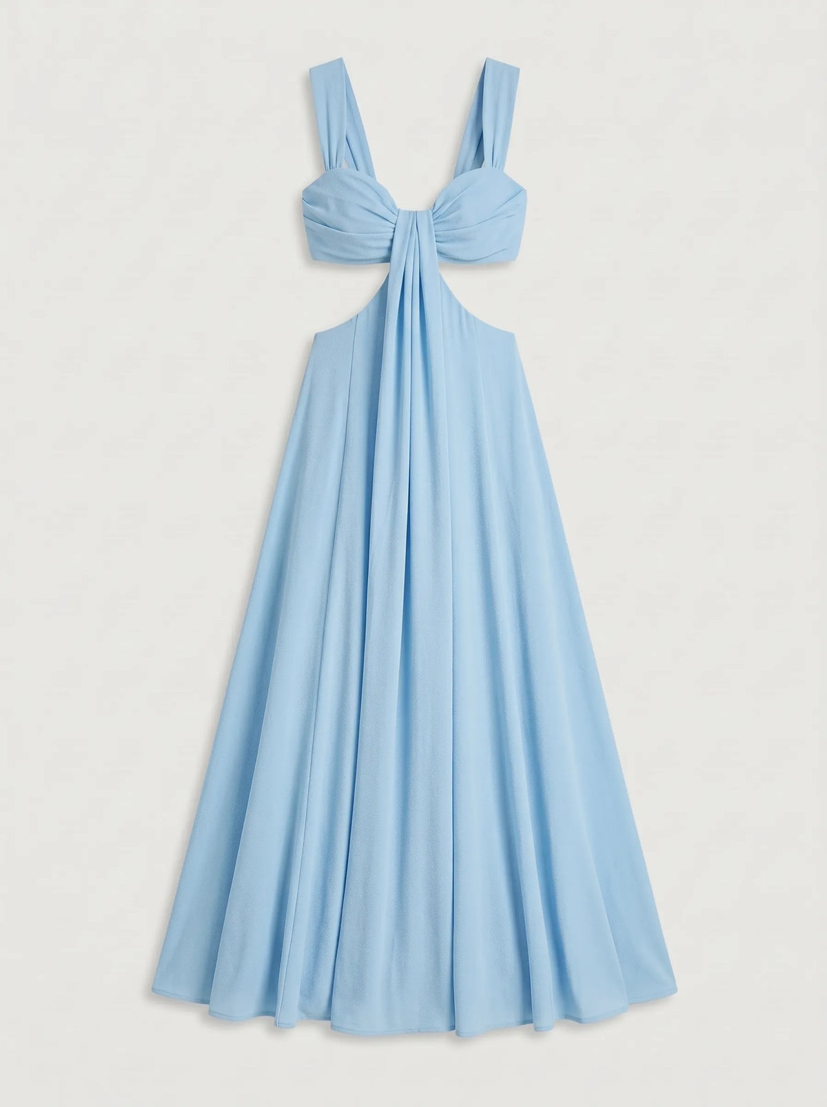 The dress shown is a crimson blue maxi dress featuring side cutouts at the waist, a structured sweetheart bustier top with gathered drape detail, wide shoulder straps, and a bow tie backclosure.