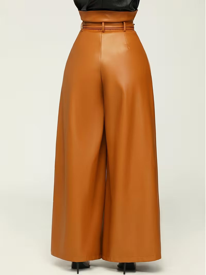 Tan leather wide-leg pants on a light beige background