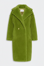 Green coat with a fur collar on a white background