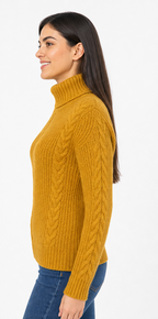 Woman wearing a mustard yellow cable knit sweater on a white background