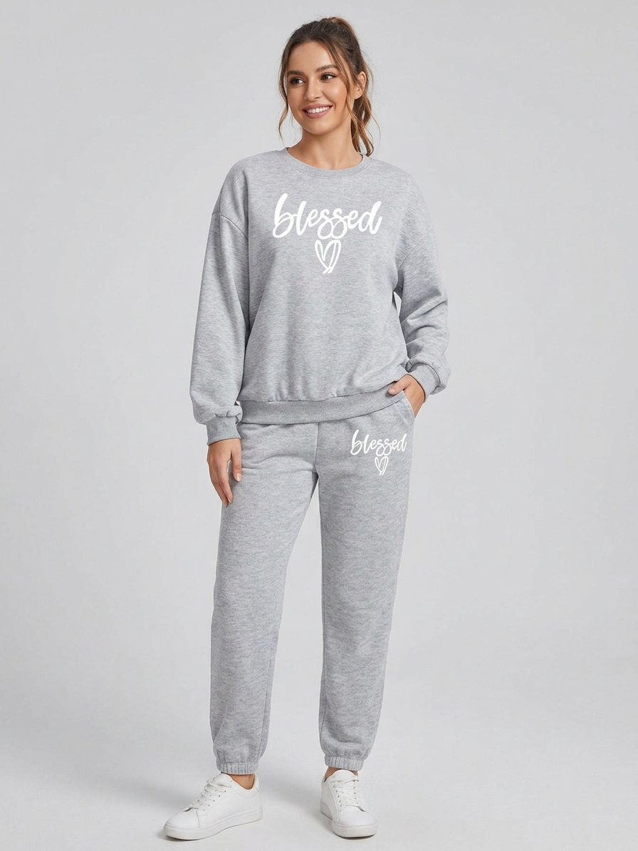 Woman wearing a gray 'blessed' sweatshirt and pants on a white background