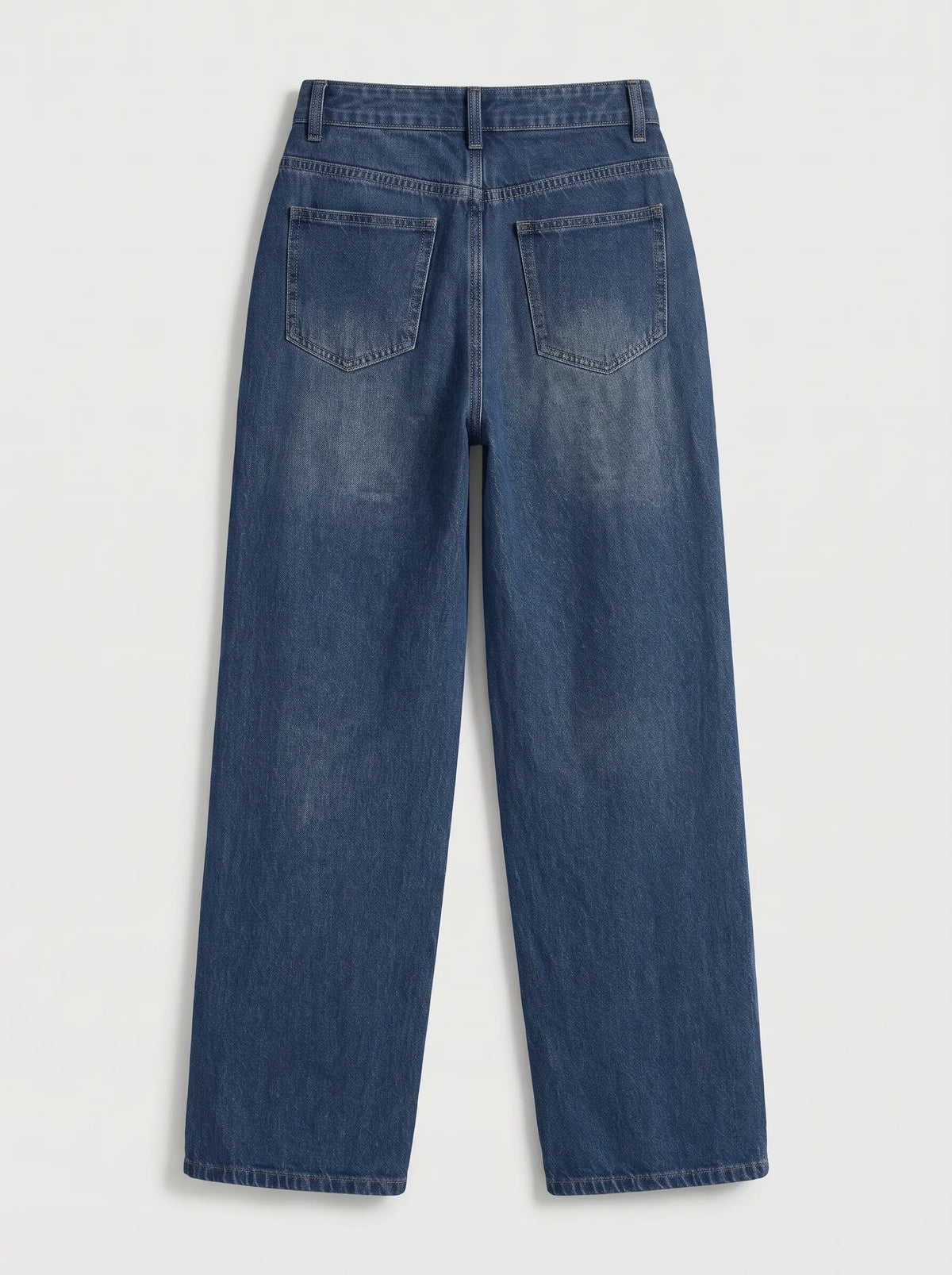 a pair of high-waisted, wide-leg denim jeans crafted from a medium-to-dark classic indigo blue wash with a subtle vertical fade down the legs and faint whiskering across the lap. The structured design features a classic five-pocket configuration, belt loops, contrast topstitching throughout, and a secure front closure with a single metallic top button and a central zip-fly.