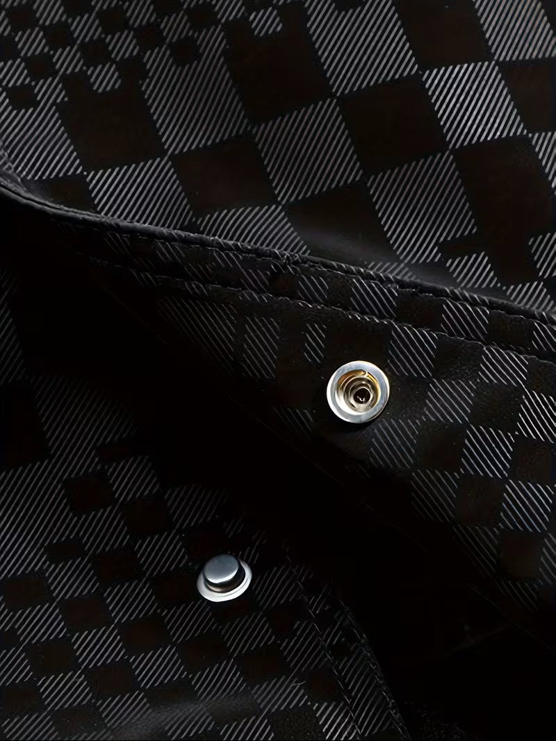 Close-up of a black and white checkered fabric with metal buttons.