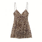 Leopard print slip dress on a white background