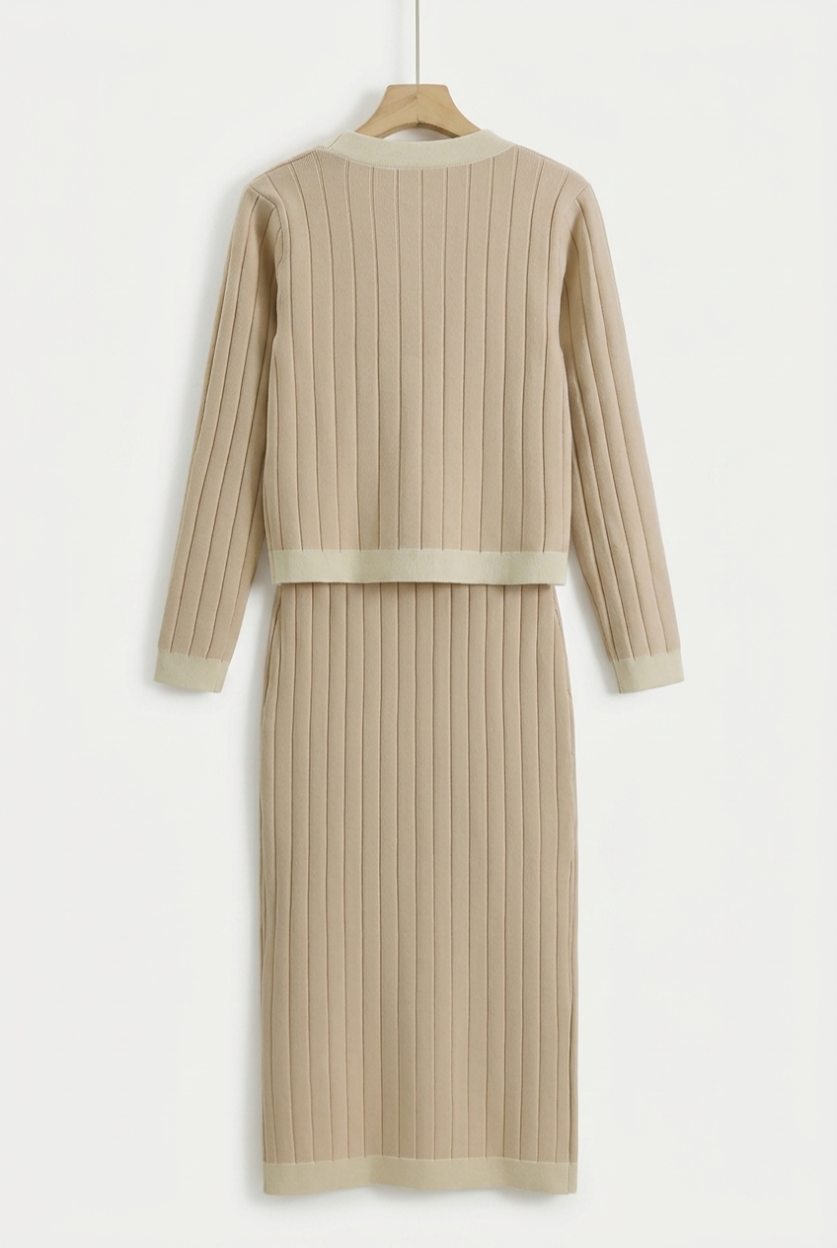 Beige ribbed knit dress on a hanger against a white background