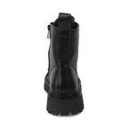 Black leather boot with thick sole on a white background