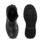 Black studded boot from top and bottom view on a white background