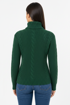 Woman wearing a Green ble knit turtleneck sweater on a white background
